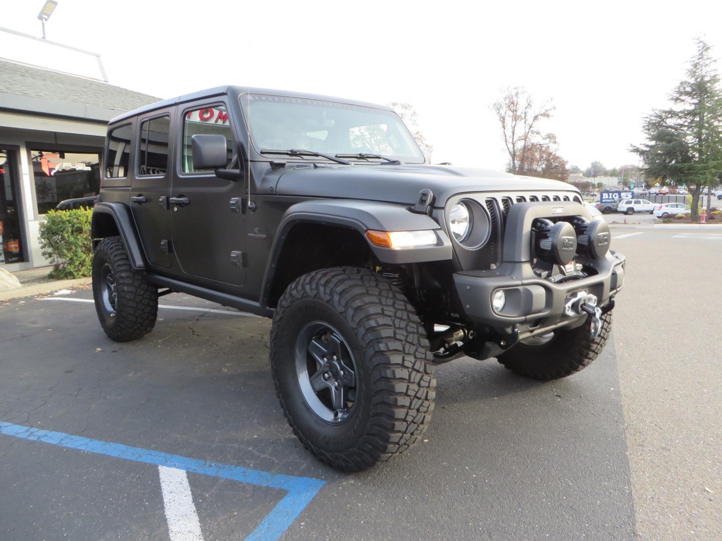 2020 BLACK /BLACK Jeep Wrangler Unlimited Rubicon (1C4HJXFGXLW) with an 3.6L V6 DOHC 24V FFV engine, 6A transmission, located at 2630 Grass Valley Highway, Auburn, CA, 95603, (530) 508-5100, 38.937893, -121.095482 - STANDARD CONTENT AEV RX Front Bumper AEV Front Skid Plate AEV Non-Winch Cover Plate AEV 7000 Series Lights AEV Light Cover Kit AEV 2.5" DualSport RT Suspension System AEV Front Geometry Correction Brackets AEV Steering Stabilizer AEV Rear Bumper AEV Swing-Out Tire Carrier AEV CHMSL Mount - Photo#2